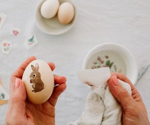 Hand dyed Easter eggs in a hand