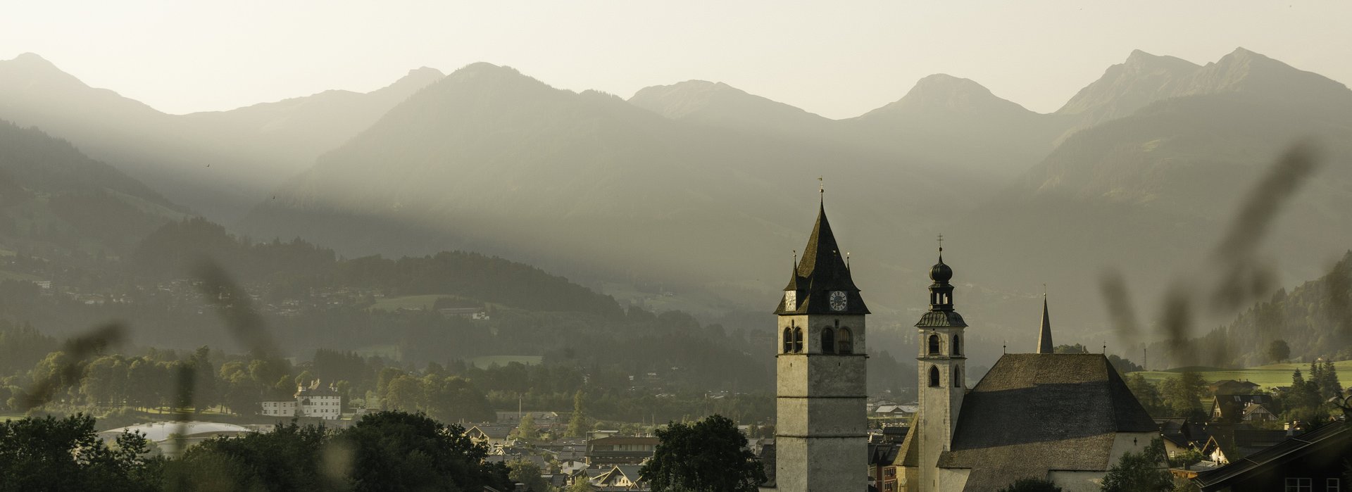 View over the Kitzbühel city center and the curch