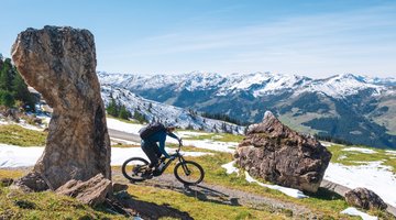 Biker between stones