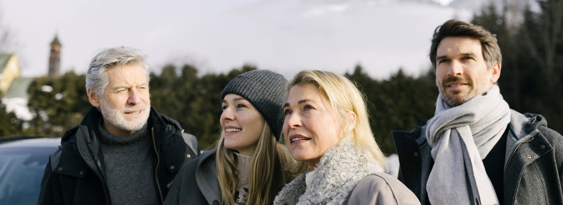 A group of guests in the winter landscape on the mountain