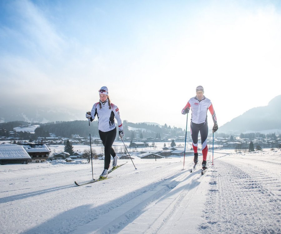 Couple cross country skiing