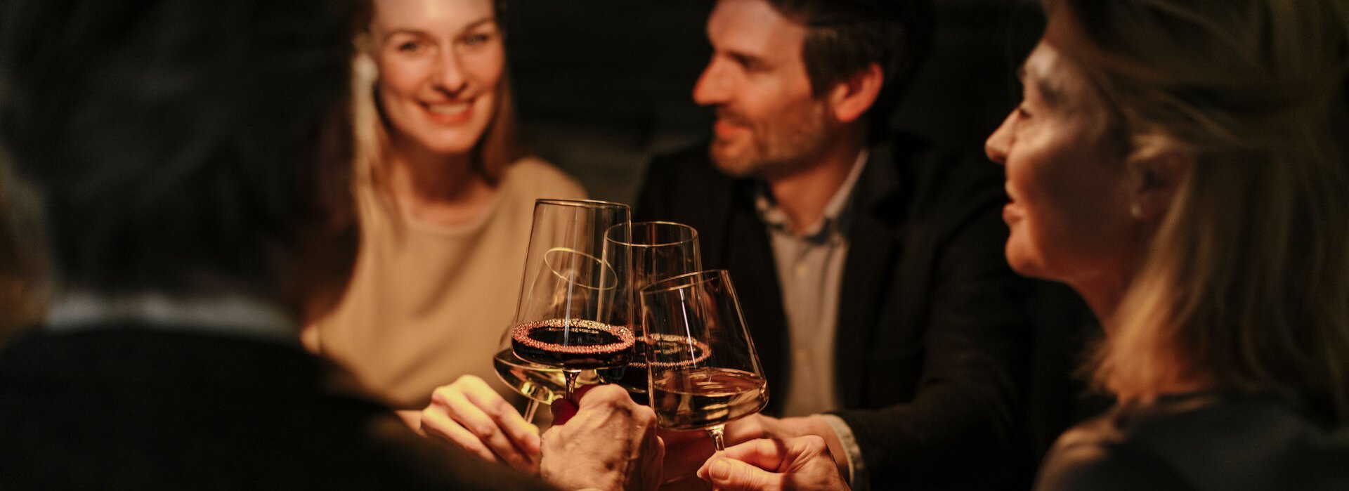 Group enjoying a glass of wine