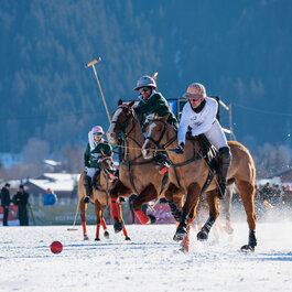 Snow polo players at a tournament in Kitzbühel