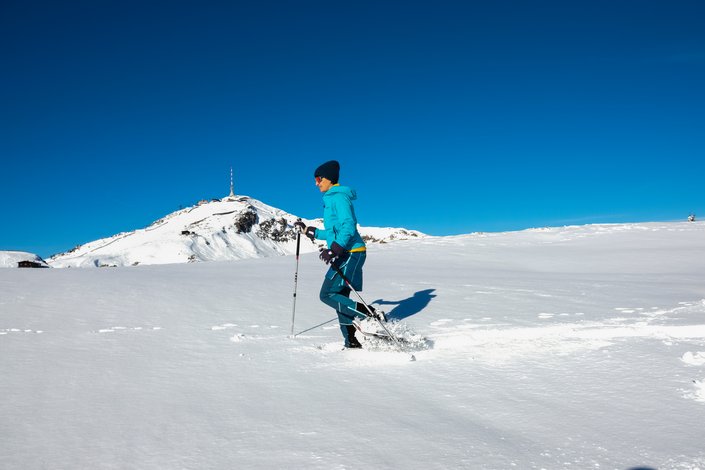 Woman with snowshoes