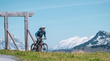Biker and mountain panorama