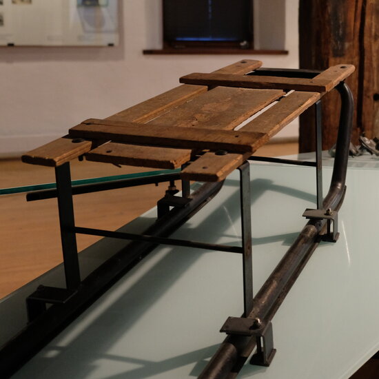 An old wooden sledge in the permanent winter sports exhibition at the Kitzbühel Museum