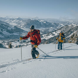 two ski tourers in the snow