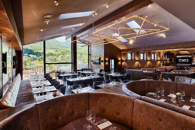 Brown sofas bar with a view Hugos