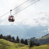 Die Hahnenkammbahn ist eine Umlaufkabinenbahn