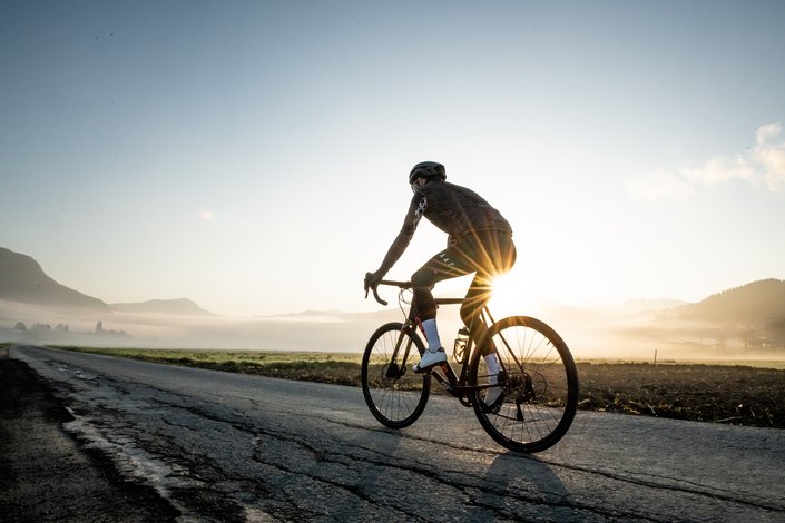 Man road biking