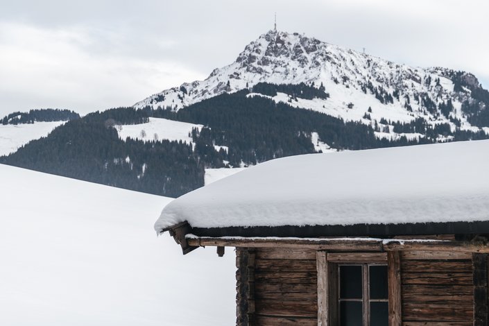 Wooden hut in the snow
