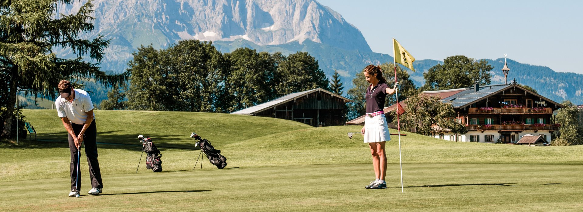 Couple playing golf