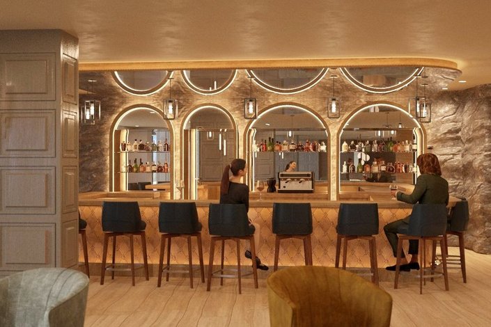 Ladies enjoying drinks in the Cooper Bar Grand Tirolia a light and modern bar