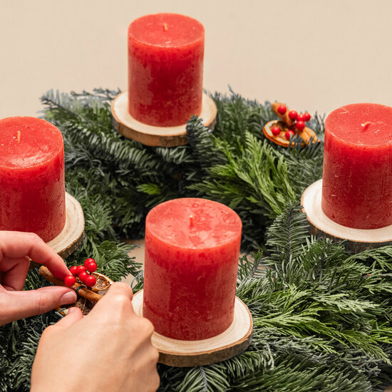 An Advent wreath with four red candles
