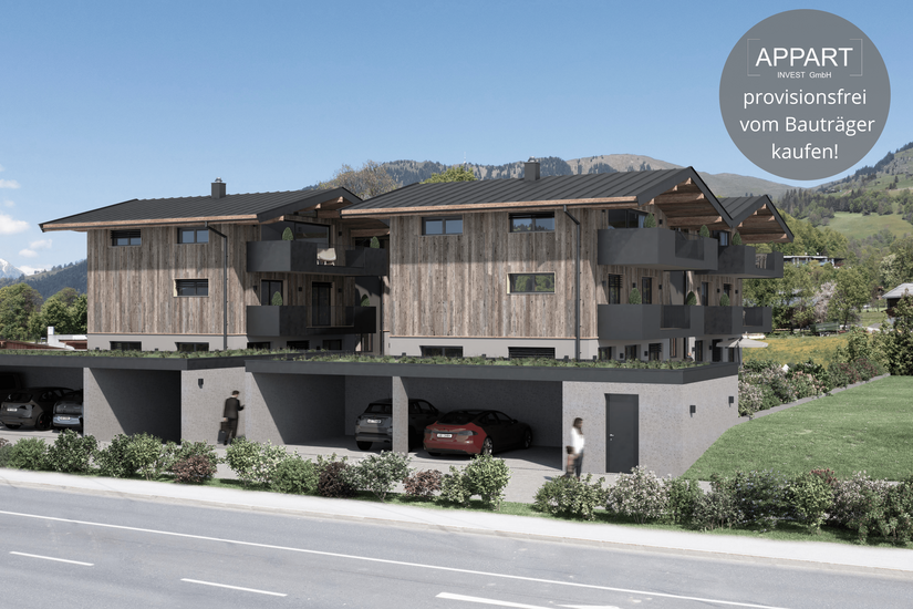 Alpin Residenzen Eichenheim Moderne Alpenresidenz mit Holzfassade, Balkonen und Carports vor einer Bergkulisse.