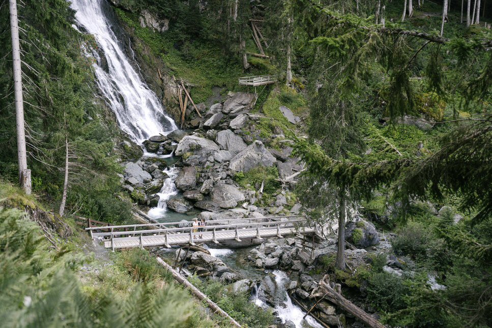 The Sintersbach Waterfall, with a bridge in the foreground