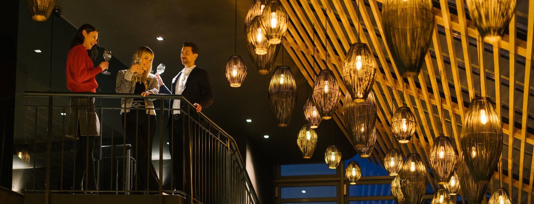 Friends having a glass of champagne at an event