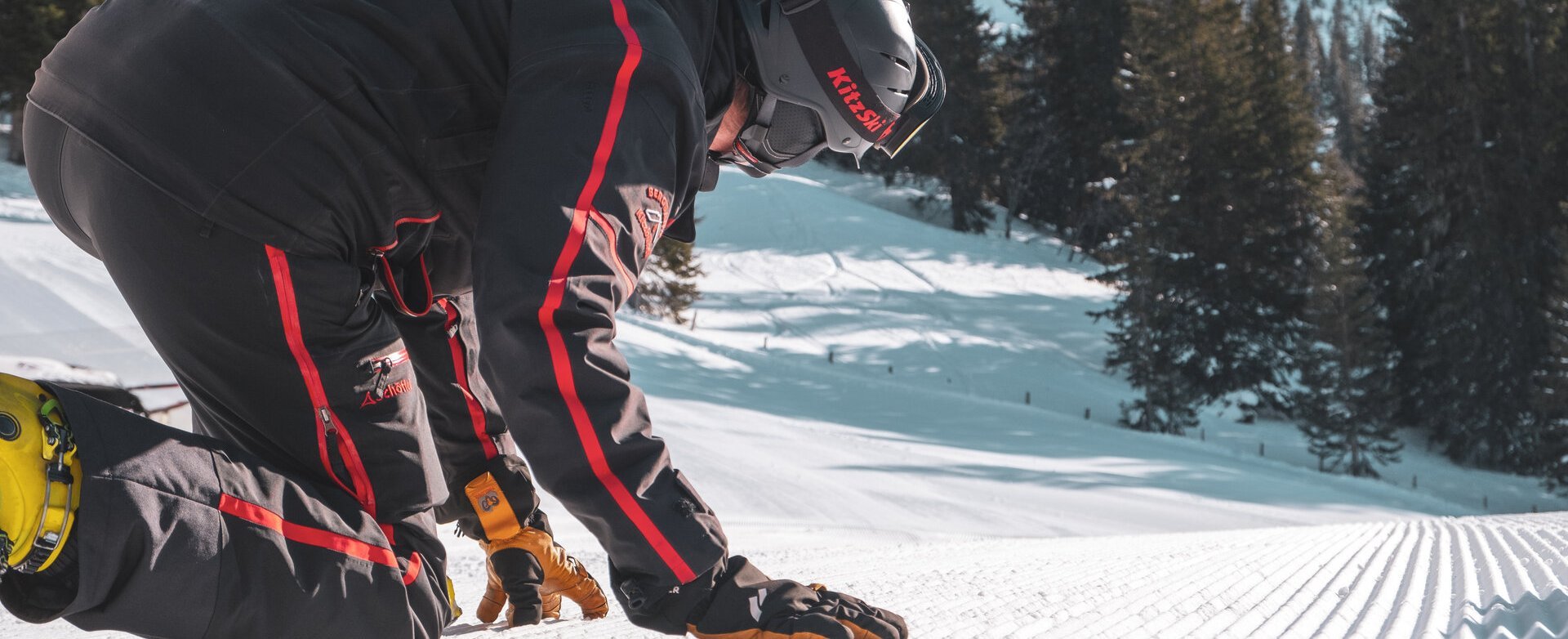 Skier on the ski pist in winter