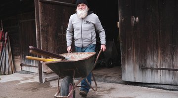 Sigi with a wheelbarrow