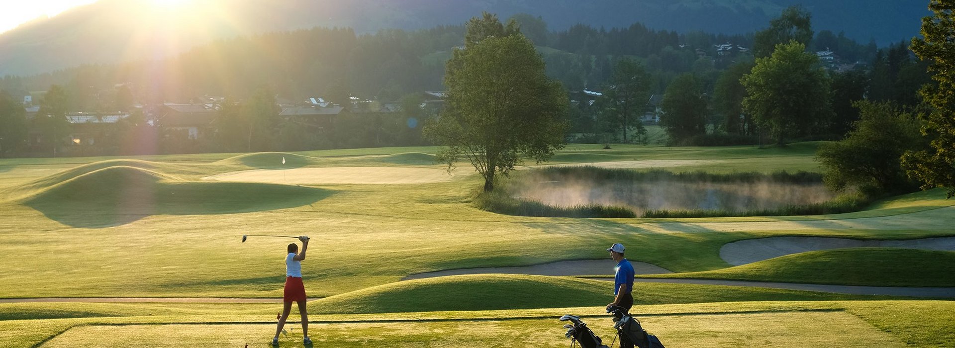 Couple playing golf