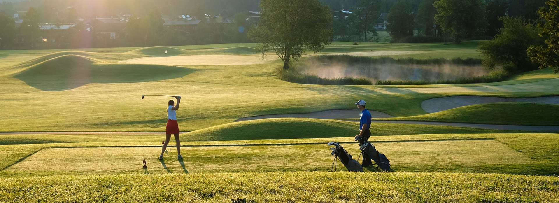 Couple playing golf