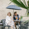 A couple is sitting in a café in Kitzbühel
