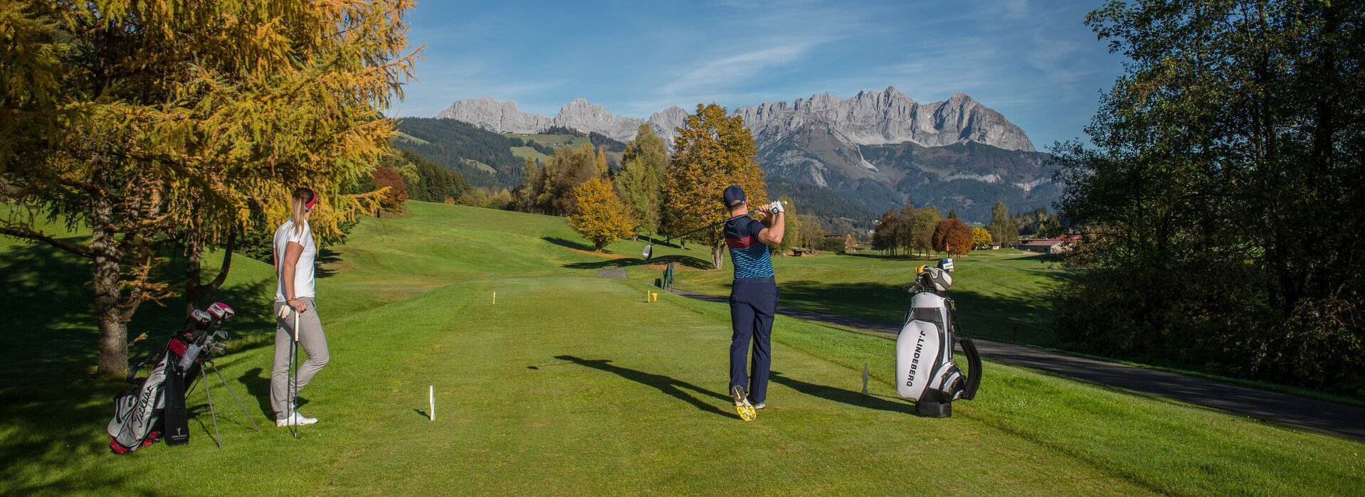 Couple playing golf