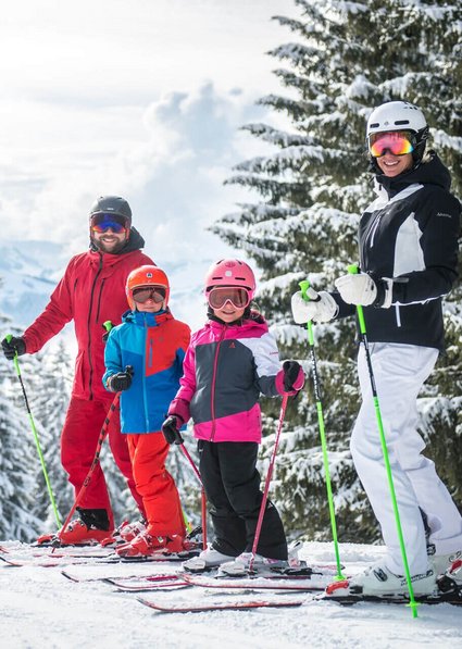 Family having fun while skiing