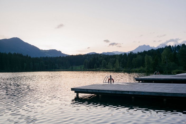 evening view by the black lake in kitzbuehel 
