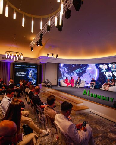 Panel discussion in the Atrium at the Grand Tirolia