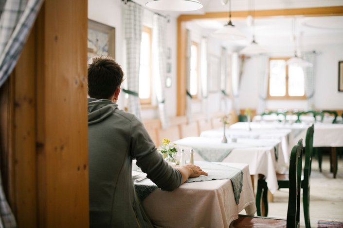 Man at table with breakfast