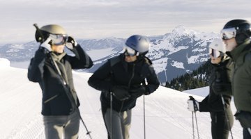 Group chatting during a break while skiing