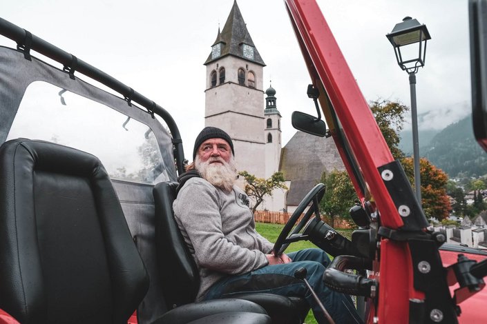 Sigi in his red jeep