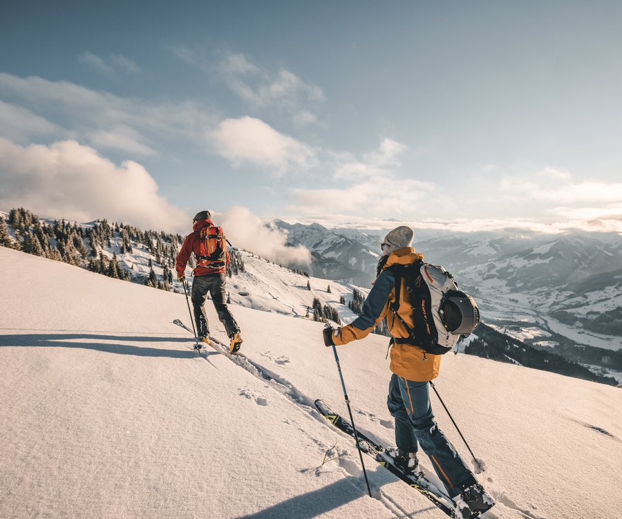 A couple skitouring at the Bichlalm