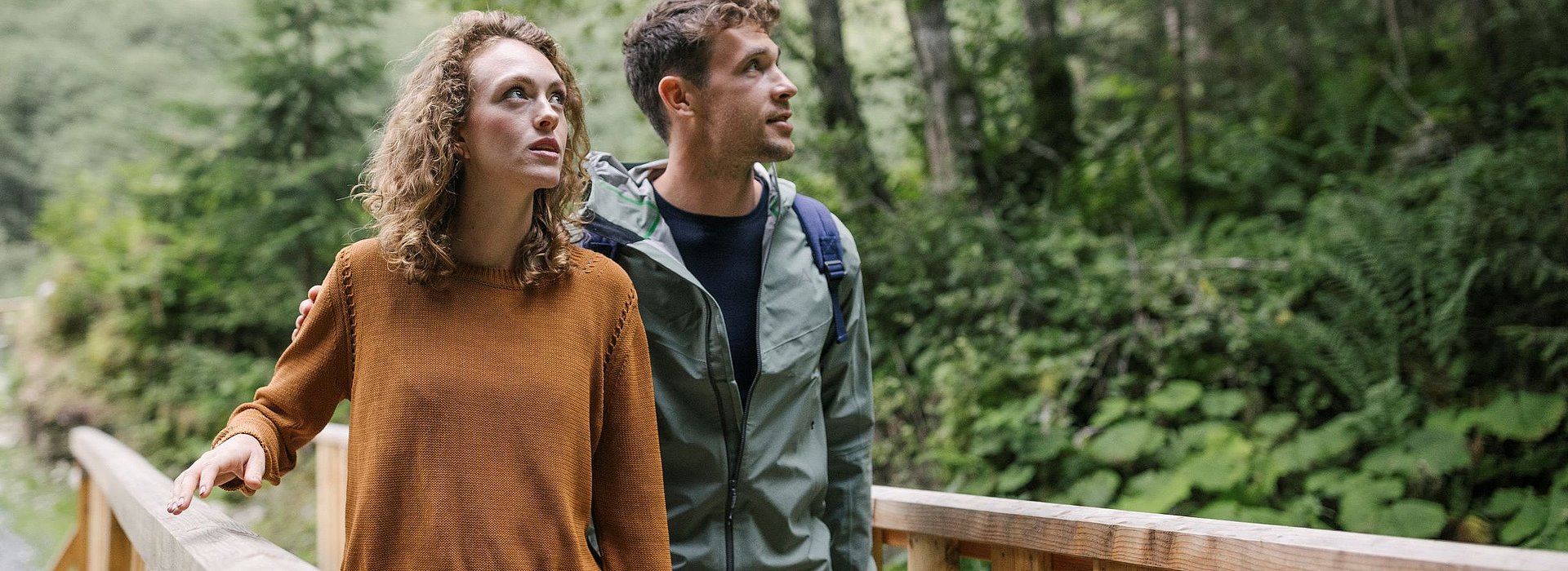 Hikers on wooden walkway